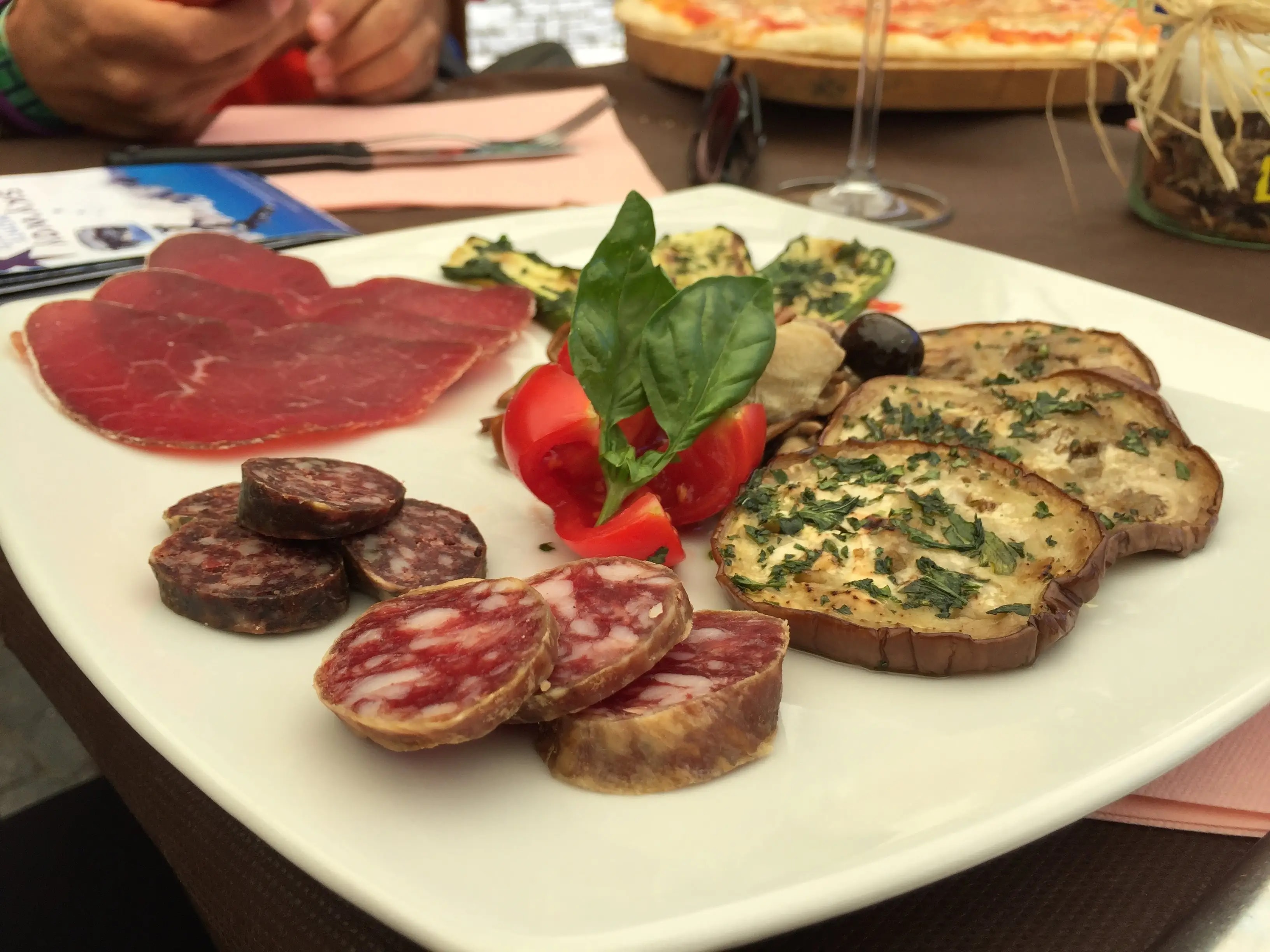 A plate of Italian antipasti and bruscetta in a Courmayeur restaurant A plate of Italian antipasti and bruscetta in a Courmayeur restaurant